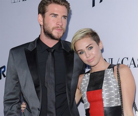 Bạn bè khuyên hôn phu của Miley Cyrus “tránh xa” cô - 1 Liam Hemsworth và Miley Cyrus
