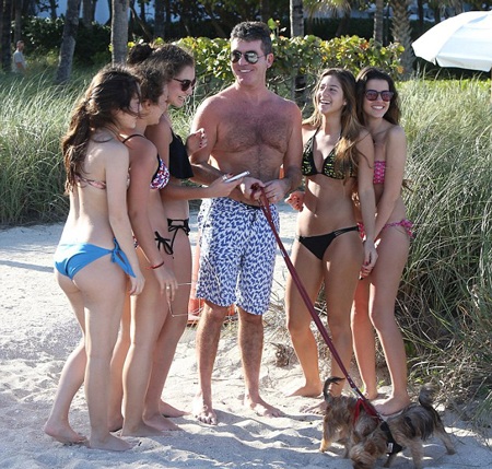 Simon Cowell âu yếm con trai nhỏ - 16 VN