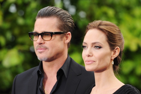 Angelina Jolie "lộ" hình xăm khủng - 6 Angelina Jolie đang bắt đầu chiến dịch quảng bá phim mới