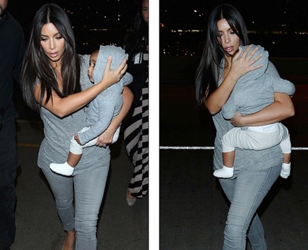 Kim Kardashian và con gái mặc áo đồng màu ra sân bay - 3 Kim Kardashian