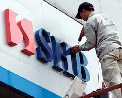 Ngỡ ngàng nợ xấu SHB - 1 Sau khi nhận sáp nhập Habubank gần 1 năm, SHB vẫn đang phải gồng mình xử lý nợ xấu.