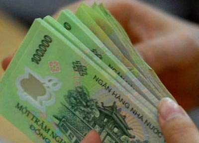 Chủ tịch BIDV phàn nàn về thu nhập - 1 Chi trả lương tại các DNNN được cho là chưa phản ánh đúng năng suất, hiệu quả lao động.