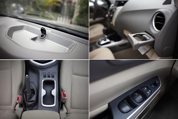 Navara EL - Sự “chịu chơi” của Nissan - 2 Những thiết kế đảm bảo sự tiện dụng trên Navara EL bao gồm các hốc để đổ bố trí trên bảng điều khiển (có kèm ổ cắm điện), phía trước khe gió hàng ghế lái, hệ thống điều chỉnh/gập gương chiếu hậu bằng điện