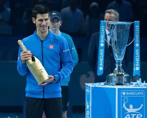 Các khoảnh khắc đưa Djokovic thống trị làng banh nỉ thế giới - 11
Djokovic cầm chai Champagne dành cho nhà vô địch