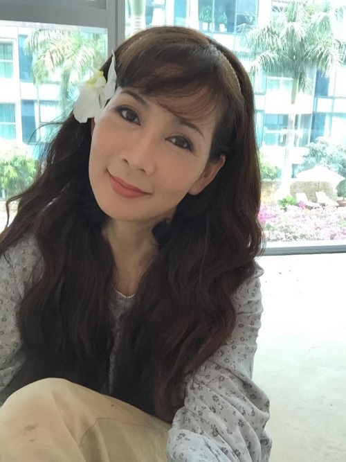 Vẻ đẹp "triệu người mê" của Nữ hoàng ảnh lịch Diễm Hương - 16 Vẻ đẹp "triệu người mê" của Nữ hoàng ảnh lịch Diễm Hương - 16