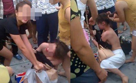 Ranh giới từ nạn nhân thành tội phạm sau những "ngứa ghẻ đòn ghen" - 1
Cảnh đánh ghen kinh hoàng trước cửa siêu thị BigC Hà Đông (ảnh trích từ clip trên mạng).