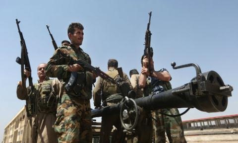 Người Kurd trong toan tính mới của các ông lớn - 1 Các chiến binh người Kurd Peshmerga. Ảnh: AP.