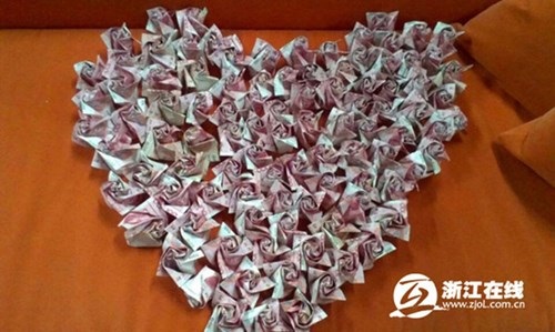 "Hoa đồng tiền"... cháy hàng mùa Valentine 2016 - 12
Trái tim bằng tiền giấy
