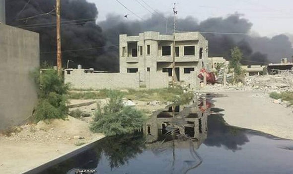 IS tìm cách thiêu rụi một thị trấn Iraq trên đường tháo chạy - 2
(Ảnh: Twitter)