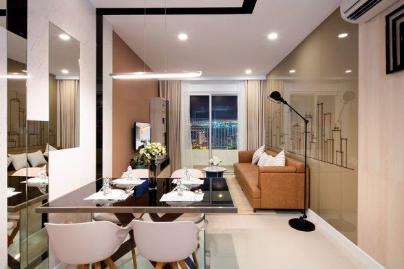 “Khẩu vị” giống nhau của nhà đầu tư bất động sản - 3
Phòng khách – căn hộ mẫu của dự án