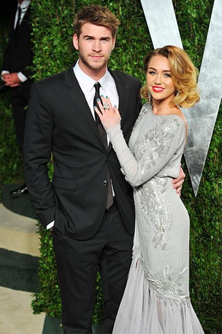 Miley Cyrus và bạn trai tay trong tay hẹn hò lãng mạn - 6 Ở bên Liam, Miley đang dần lấy lại một hình ảnh nữ tính hơn