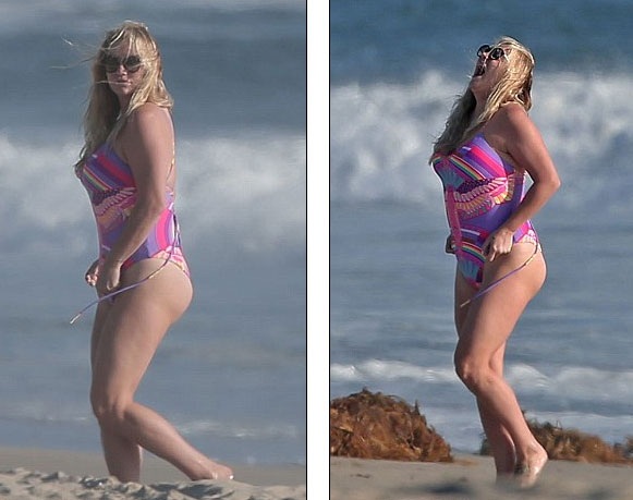 Kesha "phát tướng" trong ngày trở lại với âm nhạc - 1
Kesha xuất hiện trên bãi biển tại Los Angeles trong bộ áo tắm khá rực rỡ. Nữ ca sĩ tóc vàng đang thực hiện tour diễn mùa hè tại nước Mỹ sau một thời gian dài nghỉ ngơi.