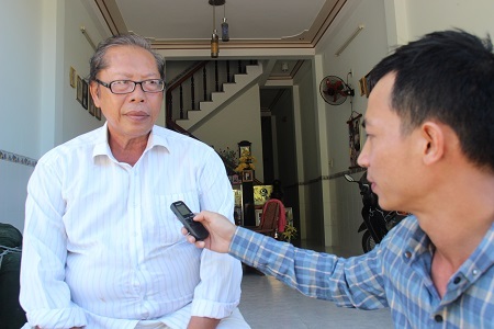 Ông Mai Thành Phúc trao đổi với phóng viên Dân trí - Ảnh: Việt Tùng