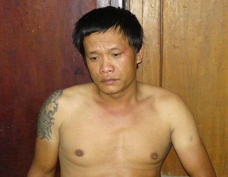 Đối tượng Nguyễn Ngọc Minh tại cơ quan điều tra - Ảnh: C.A.