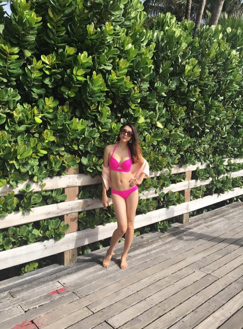 Ngọc Quyên lần đầu khoe dáng với bikini sau sinh con - 10 Ngọc Quyên lần đầu khoe dáng với bikini sau sinh con - 10