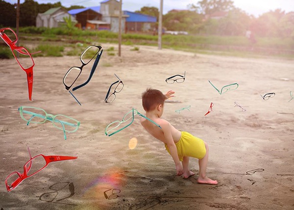 Bộ ảnh siêu thực cảnh báo về vấn nạn cận thị ở trẻ em - 2 Làm sao con bạn, hay em bạn có thể né được ma trận này. Ma trận tạo nên bởi những chiếc kính cận thị không đáng có
