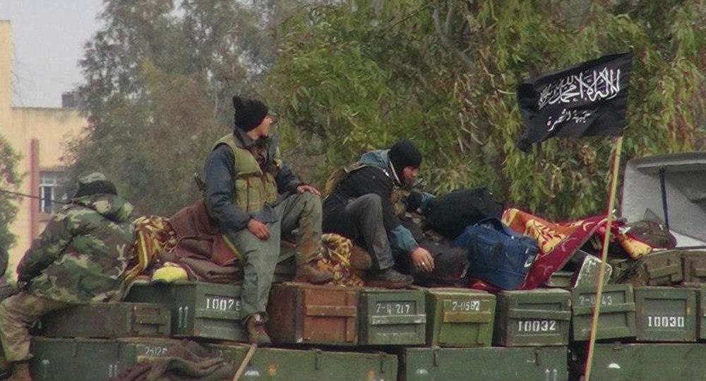 Nga: Nhóm phiến quân Mặt trận Al-Nusra tại Syria nhận vũ khí từ Thổ Nhĩ Kỳ - 1 Các xe tải chở vũ khí và đạn dược cho các tổ chức khủng bố tràn vào Syria (Ảnh: AP)