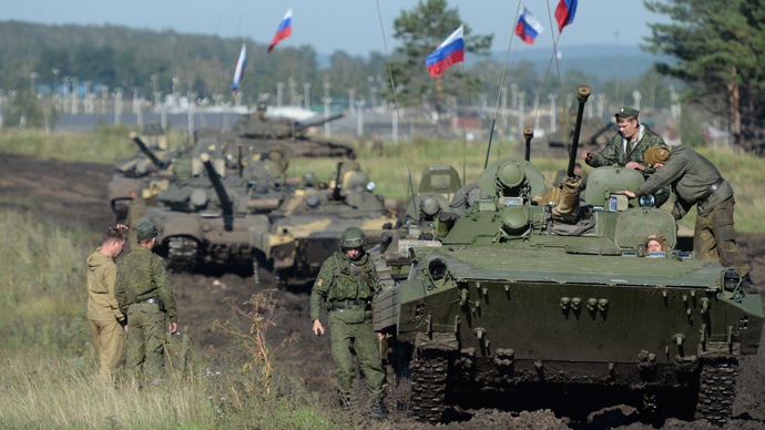 NATO “tăng gấp đôi” hoạt động quân sự áp sát biên giới Nga - 2 Lực lượng Nga tham gia cuộc tập trận Sứ mệnh hòa bình năm 2013 tại vùng Chelyabinsk (Ảnh: RIA Novosti)