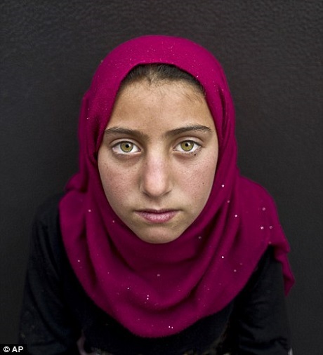 Chân dung buồn bã của những em bé Syria - 13