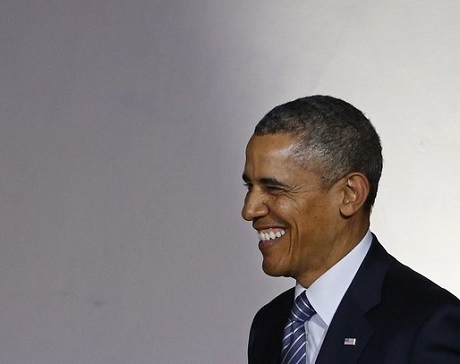 Lý giải sức hấp dẫn trong phong cách ông Obama - 11 Nụ cười rạng rỡ, thoải mái và tự nhiên.