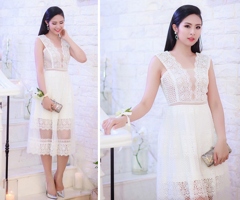 Ngọc Hân, Đặng Thu Thảo lọt top sao đẹp trong tuần - 2 Hoa hậu Ngọc Hân diện thiết kế ren trắng nữ tính, kết hợp giày cao gót ánh bạc hài hòa. Cô thể hiện phong cách dịu dàng đầy quyến rũ.
