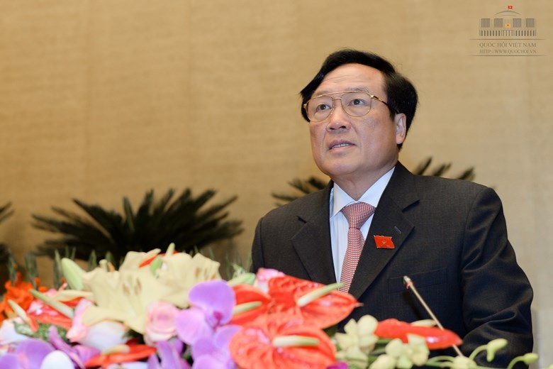 Ông Nguyễn Hòa Bình trình bày báo cáo trước Quốc hội chiều 22/3 (Ảnh: Quochoi).