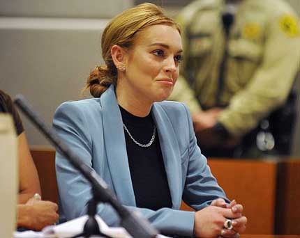 Lindsay Lohan cười tươi vì được “tự do”