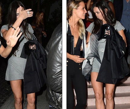 Nữ diễn viên 50 tuổi loạng choạng đi lại và che tay lên mặt để tránh giới săn tin.