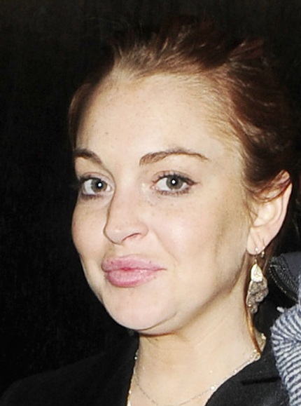Hình ảnh mới nhất của Lindsay Lohan tối 8/1 tại một hộp đêm.