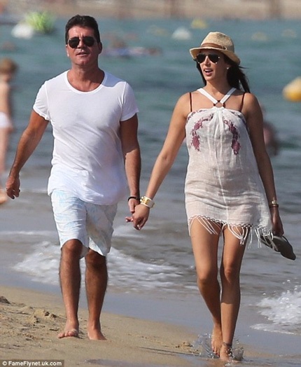 Simon Cowell sẽ có con trai - 1 Simon Cowell và bạn gái Lauren sẽ có một cậu con trai.