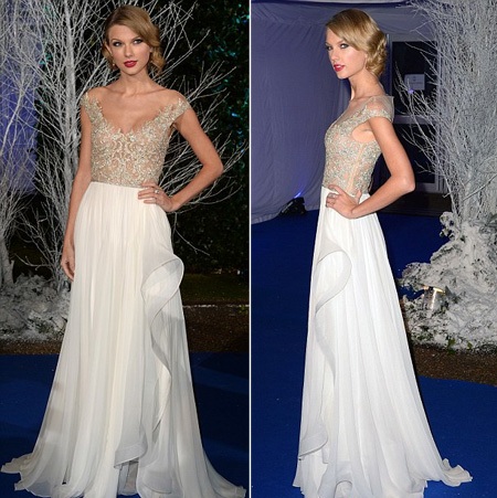 Taylor lựa chọn một chiếc váy rất phù hợp và trang điểm vừa đủ cho một bữa tiệc sang trọng.