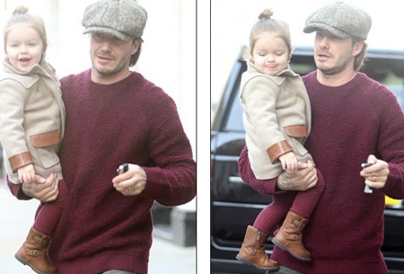 Bé Harper thích thú khi được cha ruột bế bồng.