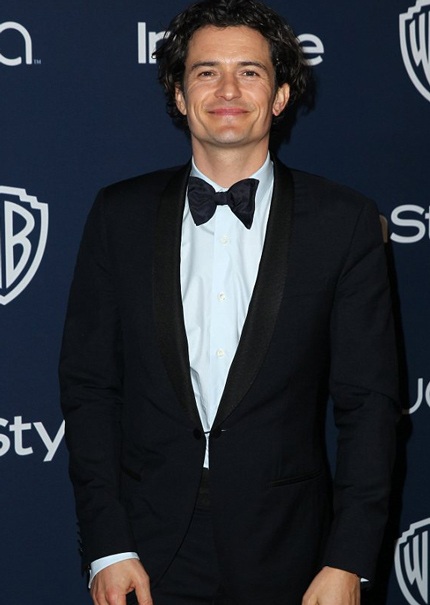 Chiếc váy của Miranda Kerr từng được Liz Hurley mặc tại một sự kiện trước đây.