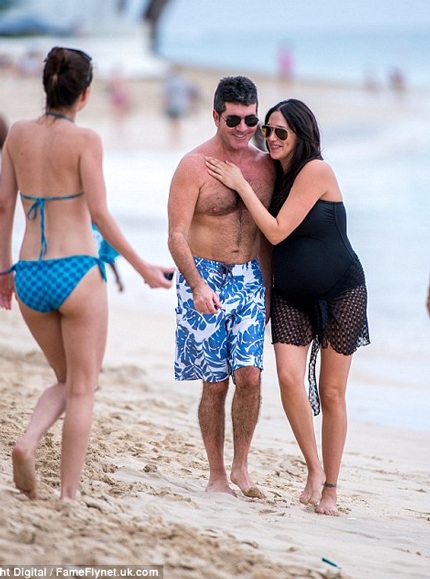 Simon Cowell chọn tên cho con trai sắp chào đời - 1 Simon Cowell và bạn gái Lauren đã chọn được tên cho đứa con đầu lòng.
