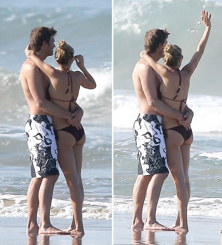 Dù đang tình tứ bên chồng, nhưng Gisele vẫn không quên để mắt tới các con.