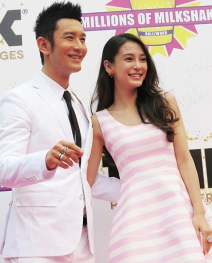 Huỳnh Hiểu Minh đẹp đôi bên bạn gái, nữ diễn viên Angela Baby tại Thượng Hải, chiều 28/5.