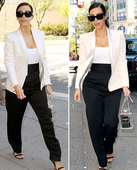 Bà mẹ một con ăn mặc khá thanh lịch và xách theo một chiếc túi vô cùng ấn tượng của Chanel.