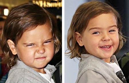 Cậu nhóc 3 tuổi còn làm 'mặt xấu' để chọc ghẹo giới săn tin đang bám theo hai mẹ con