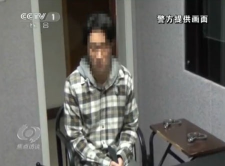 Phùng Tổ Minh tại sở cảnh sát ở Bắc Kinh, ngày 18/8.