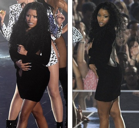 Nicki dường như đứng hình trên sân khấu trong khi tay cô vẫn giữ chặt thân váy