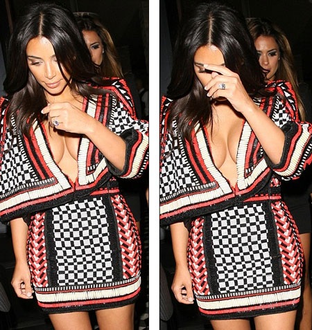 Cô nàng né tránh ống kính của giới săn tin.