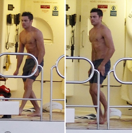 Zac Efron để lộ thân hình lực lưỡng và cơ bụng săn chắc khi đi lại trên du thuyền