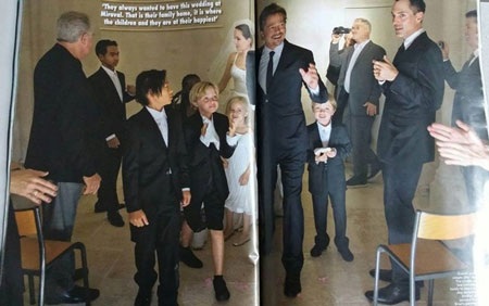 Brad Pitt và Angelina Jolie hôn nhau trong tiếng vỗ tay và reo hò của các con.