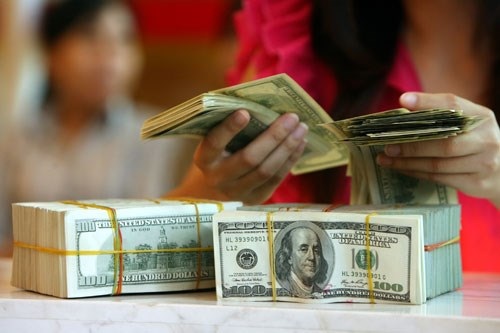 “Điều chỉnh tỷ giá giúp giải tỏa tâm lý đầu cơ, găm giữ USD” - 1 Tỷ giá tự do ngày 6/5 đã có lúc lên trên 21.700 đồng mỗi USD -