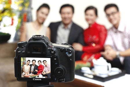 Chụp ảnh chung với gia đình