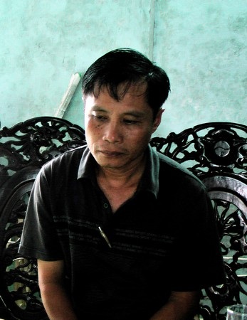 Đối tượng Huỳnh Sơn tại cơ quan công an. Ảnh: