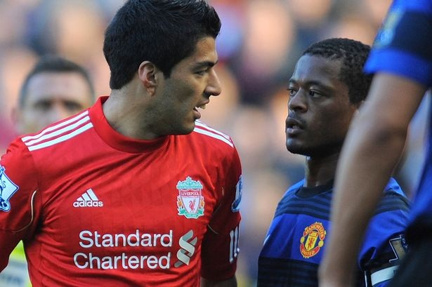 Evra hứa sẽ bắt tay Suarez - 1 Evra hứa sẽ bắt tay Suarez
