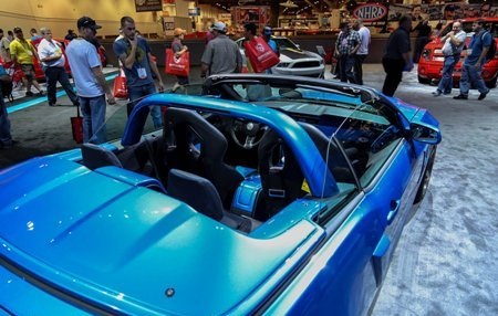 Ngắm dàn xe Mustang độ tại Triển lãm SEMA 2012 - 9 Xe có màu sơn đỏ bắt mắt và nội thất với trang bị ghế ngồi Sparco thể thao