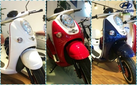 DòŮg xe máy điện E-Motion với ba màu: trắng,
xanh, đỏ