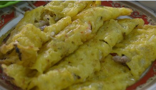 Bảng hiệu khá khiêm tốn của quán “Bánh xèo bà Dưỡng”